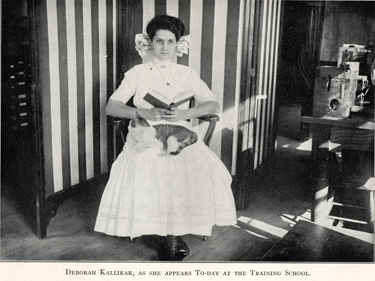 In a photo in Goddard's book, "Deborah Kallikak" is shown sitting demurely holding a book. 