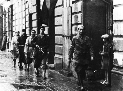 AK (Home Army)  troops marching to battle on August 1, 1944. 'Agaton' leads his platoon.